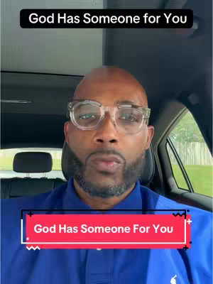 A man with glasses is seated in a car. Text overlays: "God Has Someone for You" in a black bar at the top and also in a red rectangular graphic near the bottom. The man is facing the camera.
