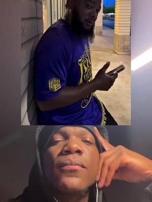 The cover image is divided horizontally with two scenes. The top half shows a man with a beard wearing a purple shirt with text and a symbol, holding a phone and leaning against a wall. The background shows a dimly lit outdoor setting. In the bottom half, a close up of another man's face is shown, from a lower perspective, facing the viewer.