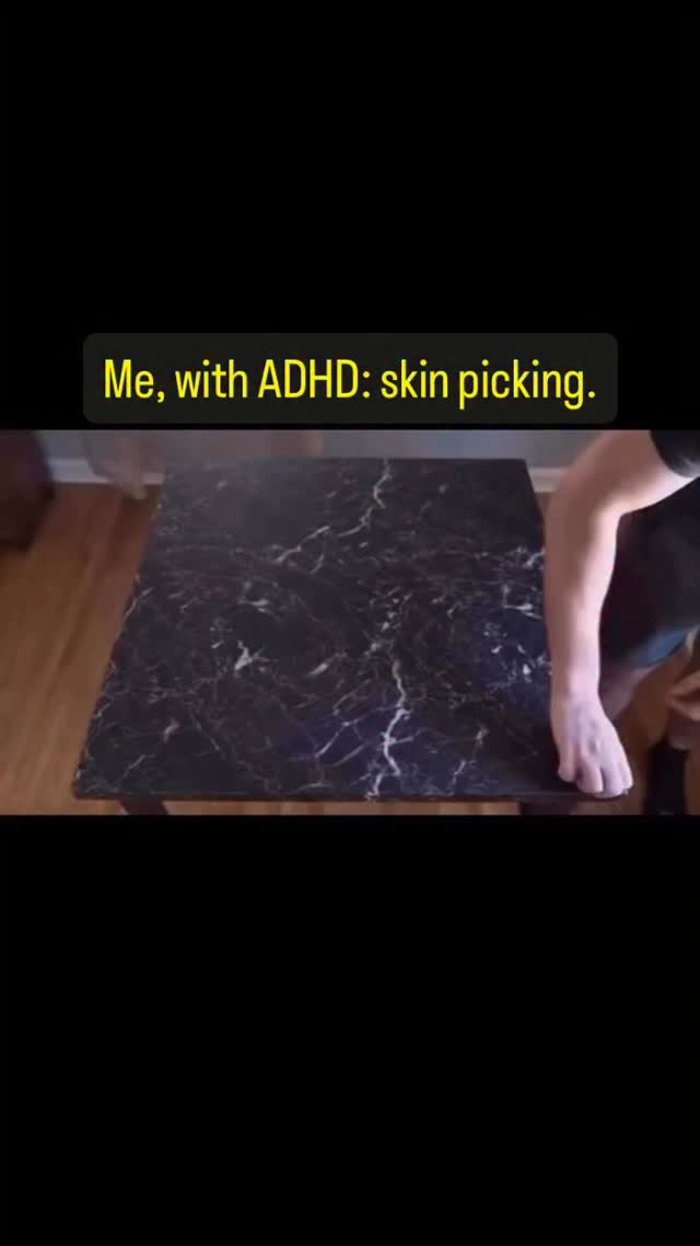 The cover image shows a top-down view of a black marble-patterned table. A person's hand is partially visible on the right side, presumably reaching towards or touching the surface of the table. A text overlay appears, which states, 'Me, with ADHD: skin picking.'