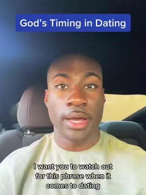 A medium shot featuring a Black man in a car, looking directly at the camera. He's wearing a light-colored t-shirt. The text overlay reads "God's Timing in Dating" at the top and at the bottom "I want you to watch out for this phrase when it comes to dating". The background is blurred but suggests a car interior.