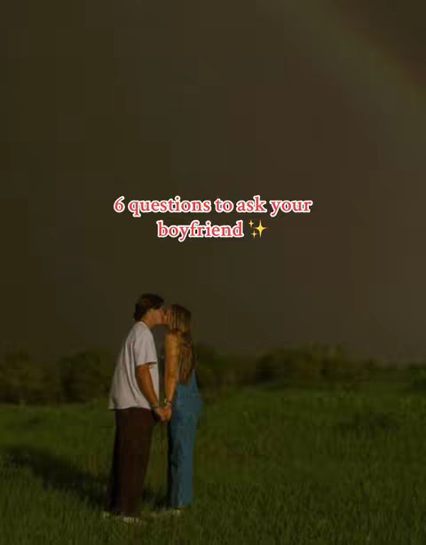 A couple is embracing and about to kiss in an open green field with text overlayed. The background is a dark stormy night sky. The text says: "6 questions to ask your boyfriend"