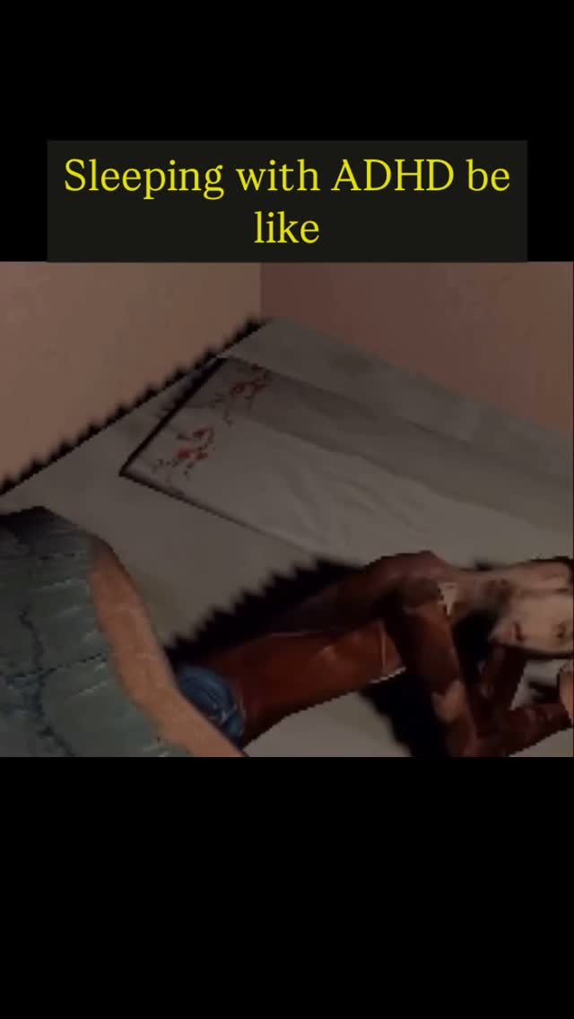 The image shows a low-resolution, somewhat blurred view of a person lying in bed. The scene has a muted color palette with a brown wall and a patterned bedspread. The text overlay reads Sleeping with ADHD be like.