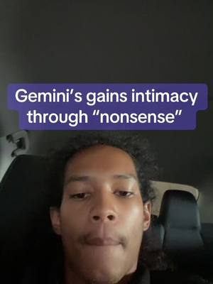A selfie-style image with a man in the foreground, apparently inside a vehicle judging from the background. Above him is a text overlay on a colored box.