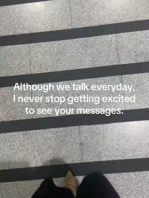 The image shows a top-down view of steps and the feet of a person standing on them. Text is overlaid on the image with the words: 'Although we talk everyday, I never stop getting excited to see your messages.'