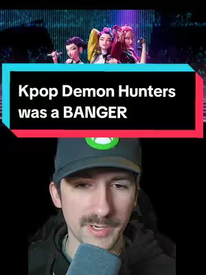 The cover image is divided into two main sections. The upper half shows a stylized, animated image of three characters, presumably from the K-pop Demon Hunters. The lower half features a person in front of a black background, with a beard and a hat.