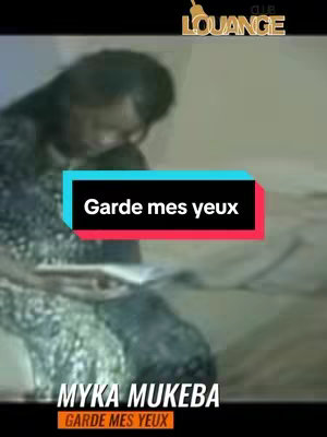 The cover image shows a woman with her head bowed, possibly in a moment of prayer or contemplation. The background is blurred, focusing attention on her. A text overlay with the words 'Garde mes yeux' is prominently displayed.