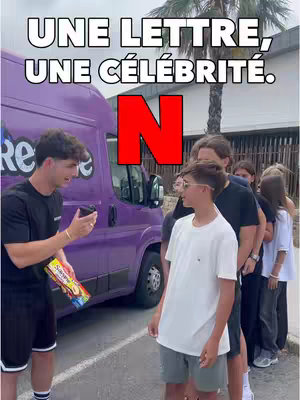 A cover image features a group of people, mainly young men, standing near a purple van. The scene appears to be outdoors, with sunlight and a blurred background of trees. The video hook overlayed shows the text: 'UNE LETTRE, UNE CÉLÉBRITÉ.' and a large red letter 'N'.