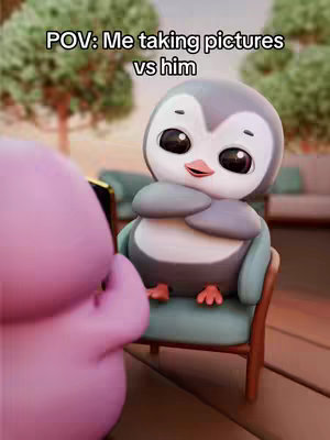 The image shows two cartoonish figures in a setting that appears to be outdoors. A large, pink, amorphous shape is on the left side of the frame, facing towards a penguin-like character on the right. The penguin is seated in a small, teal armchair and has large, expressive eyes and a beak. The background shows out-of-focus trees and what appears to be a sofa.