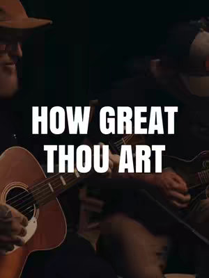 The image shows two men playing acoustic guitars in a dark setting. Text overlayed in white reads: HOW GREAT THOU ART.