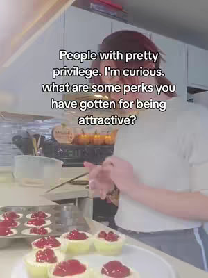 The cover image shows a kitchen scene with a person in a light-colored shirt standing near a countertop. The person is handling the preparation of cupcakes. In the foreground are cupcakes with red topping. Text overlay is included to create the hook.