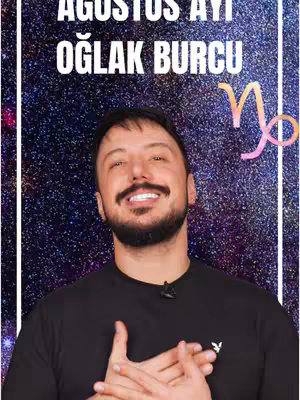 A man with a beard and a smiling expression is centered, against a background that fades from dark to light blue with glitter effects. Text at the top states 'Ağustos Ayı Oğlak Burcu'. A Capricorn symbol floats on the right side, and the man wears a black shirt.
