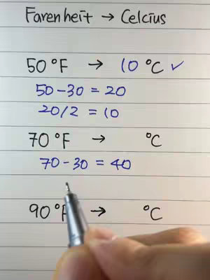 The image shows a handwritten math problem on a white lined paper. At the top is the title 'Farenheit -> Celcius'. The problem is solving conversion problems from the Fahrenheit to Celsius. An example problem is completed and a person's hand is holding pen at the bottom.