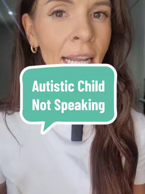 A woman is centered in the frame, her face taking up most of the space. She is looking towards the viewer with an open mouth, as if speaking. Overlaid on her is a speech bubble containing the text 'Autistic Child Not Speaking'. She is wearing a white t-shirt and gold hoop earrings.