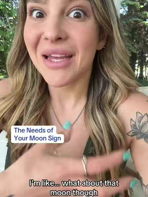 A woman with blonde hair and light skin is looking directly at the camera, with a slightly surprised expression. Text overlays are present near her and near her hand.