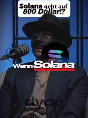 The cover image features a man in a suit, a hat, and a mask, with text overlays. The background suggests a studio setting. The image is professionally lit and composed.