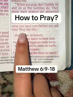 A close-up shot showing a hand with painted nails pointing at a page of a Bible. Text overlays provide a title and scripture reference.
