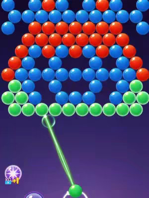 A screenshot from a bubble-shooter game shows a grid of colored bubbles with a green targeting line and a green bubble ready to be shot.