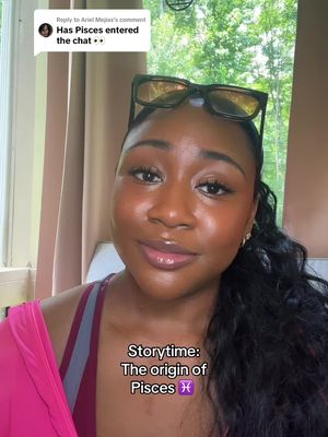 The cover image features a woman's face at a close-up angle, framed within a vertical format. She's dark-skinned and appears to be of African descent, glancing slightly off-camera. Her hair is pulled back, and she wears clear-framed glasses on top of her head. The lighting seems to be natural, highlighting her skin and features without harsh shadows. The background includes blurred elements that suggest an indoor setting, potentially near a window or light source. Overlayed on the image is text appearing at the bottom.