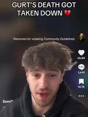 A selfie-style video cover with a young man in the foreground. The background is blurry and dark, possibly a room. The video includes overlaid text at the top, a broken heart emoji, and a notification from TikTok at the bottom.