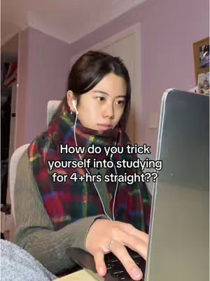 A young woman is seated, presumably indoors. She is wearing a plaid scarf and earphones, and she has a laptop open in front of her. Text overlayed on the image asks how one can trick themselves into studying for over four hours straight.