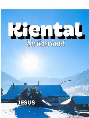 A serene winter landscape with snow-covered buildings and mountains under a bright sun. The text overlays include the name of the location.