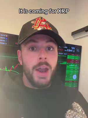 The cover image features a man with a beard and a cap, looking directly at the camera with an excited expression. Behind him is a large screen displaying financial data and charts, suggesting a focus on cryptocurrency or stock market analysis. The background is a simple, neutral wall, keeping the focus on the man and the screen. The overall composition is a close-up shot, emphasizing the man's expression and the data on the screen.