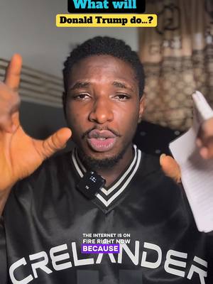 The cover image shows a brown-skinned man looking directly at the camera, hands raised with the palms facing forward. Above him, text in a turquoise box reads 'What will Donald Trump do...?'. He is wearing a black shirt with white trim and the word 'CRELANDER' in large white letters. Text at the bottom in a purple box says 'THE INTERNET IS ON FIRE RIGHT NOW BECAUSE'. The background is subtly lit, possibly indoors.