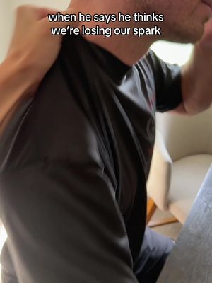 The cover image shows a person, likely male, from the chest up, possibly in an interior setting. A hand is visible on the left side holding the person. Text overlay includes the phrase, "when he says he thinks we're losing our spark."