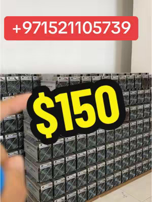 The image shows a setup of cryptocurrency mining hardware filling most of the frame. The background is a light, neutral color. In the foreground, a hand with a finger pointing towards the equipment shows a banner with the price tag of "$150". Above, a red banner displays a phone number. The overall composition focuses on the business aspect of cryptocurrency mining.