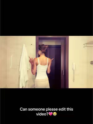 A person is seen from the back, standing in a bathroom. They are facing a doorway, and there is a shower on the left, with a towel hanging on a wall. The person appears to be requesting video editing help, with a text overlay at the bottom.