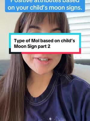 The cover image shows a woman in a close-up, facing the camera, with text overlaying the top and middle portions of the frame. The woman has long brown hair with bangs, fair skin, and is wearing a dark blue t-shirt. Above her, a light blue box contains white text that reads 'Positive attributes based on your child's moon signs.' Below that is a turquoise-colored rectangle with the title 'Type of Mol based on child's Moon Sign part 2.'