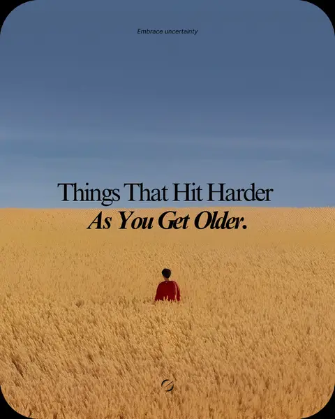 The image shows a person in a red shirt standing in a field of tall, golden grass or wheat. Above, a blue sky fills the top portion. Text overlays include the phrase "Things That Hit Harder As You Get Older." The composition evokes a sense of introspection and reflection.