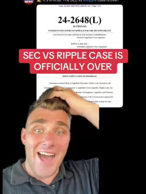A man with short, light-brown hair is shown from the chest up, looking at the camera with wide eyes and an open mouth, expressing excitement. He is wearing a dark gray, collared shirt. Behind him, a document is displayed on a white background, with the headline 'SEC VS RIPPLE CASE IS OFFICIALLY OVER' in a bright red box. The background is black, emphasizing the central focus on the man and the document.