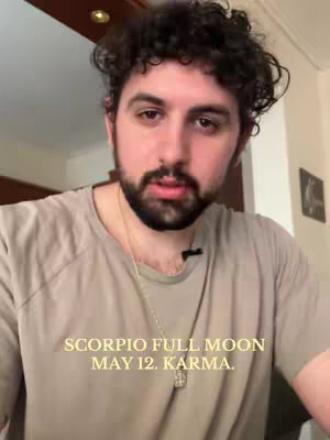 A man with curly dark hair and a beard is looking directly at the camera. Text overlays the image.
