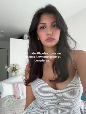 A young woman with dark hair and fair skin is the main focus, wearing a striped dress while looking at the camera. She is positioned in front of a bed, and text overlays the image. The colors are natural with daylighting.