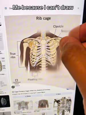 The cover image displays a person's hand holding a pen, pointing to an image of a human rib cage diagram on a screen. Text overlays that begin with the phrase 'Me because I can't draw' appear in the top-left edge of the screen.