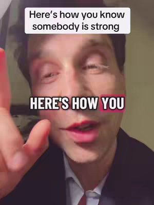 A close-up shot features a person, seen from the chest up. The person is actively speaking while the hand is placed near the face. Overlayed text fills the screen to make the hook