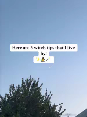 The cover image displays a bright blue sky with a leafy green tree in the lower part of the image and a building partially visible on the right side. The sky appears bright blue. Centered in the sky, there is a white rectangle with text and small graphics overlayed. The text, "Here are 5 witch tips that I live by!" is above an image of a witch.
