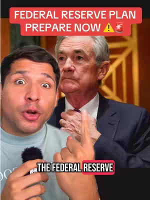 The cover image presents a split-screen effect. On the left, a man is shown with an expressive, somewhat surprised face. He's gesturing with his right hand, which holds a microphone. The text overlay at the top states "FEDERAL RESERVE PLAN PREPARE NOW ". Beneath, the text "THE FEDERAL RESERVE" is displayed in a rectangular, colored bar. On the right side of the image, there's a picture of an older man with a more serious expression.