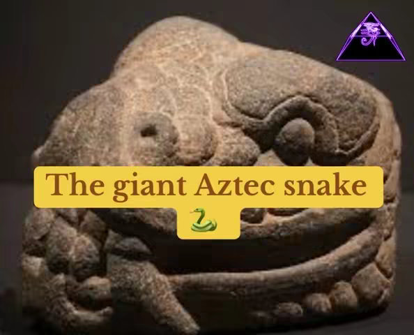 The cover image features a close-up of a large, weathered stone carving of a snake, possibly Aztec. The carving has intricate textures and details, with a yellowish-brown color palette. Overlayed on the image is a yellow rectangle with the text "The giant Aztec snake", accompanied by a snake emoji. A purple triangle with an eye symbol is situated in the top right corner.
