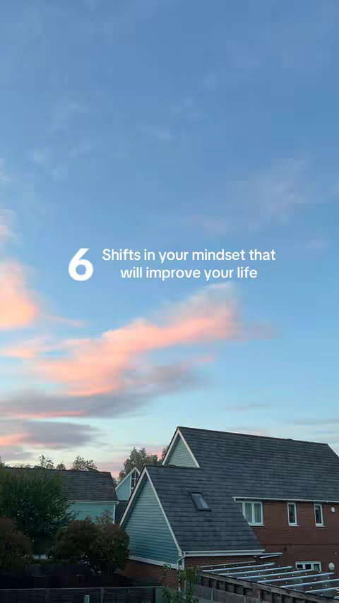The image shows a residential scene under a sky with a gradient of colors. A blue to pink cloudscape dominates the top portion, with shades of blue gradually transitioning into pink and orange hues suggesting a sunset or sunrise. Below the sky, houses with gray-tiled roofs are visible, some with teal-colored siding. The composition is framed vertically, with the text overlay at the top, and the houses situated at the bottom.