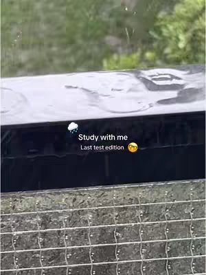 The cover image shows a dark surface with raindrops, possibly the top of a car or another object. In the background, blurred green foliage suggests an outdoor setting. The text overlay reads "Study with me", followed by "Last test edition" and an emoji of sunglasses.