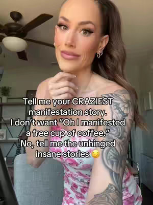 A woman in a floral dress sits in front of a blurred background. She is looking at the camera and has a slight smile. The image has text overlayed on it.