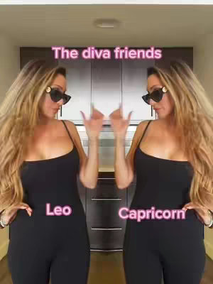 The image is a mirrored composition showcasing a person with wavy blonde hair, dark sunglasses, and a black romper. The person has one hand on their hip and the other raised with open fingers. The background includes a kitchen setting. The text overlay shows "The diva friends" and the astrological signs "Leo" and "Capricorn".