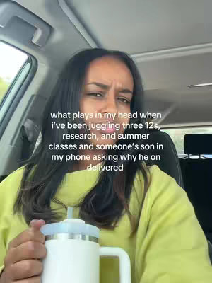 A woman with dark hair looks at the camera with a disgruntled expression. She is in a car, holding a white thermos. Above her, white text is overlaid on the image, describing a series of stressful activities.