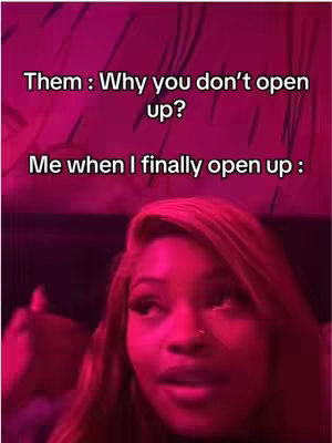 The image features a woman with long, highlighted hair, looking up and to the side with a slightly perplexed expression. The lighting is dominated by a bright, reddish-pink hue across the scene, emphasizing the woman's face and the surrounding space. Text overlays indicate a scenario where the woman is hesitant to 'open up'. The composition is simple, focusing primarily on the woman's face and expressive features.