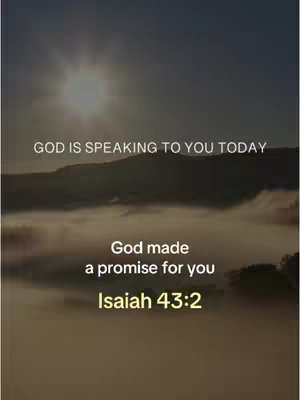 The image features a scenic landscape with a cloudy sky and a bright sun in the background. The top of the image includes white text reading 'GOD IS SPEAKING TO YOU TODAY'. Below this text, a mountain range can be seen through the clouds. Towards the bottom, the text 'God made a promise for you' is in white font, followed by 'Isaiah 43:2' in a highlighted yellow font.