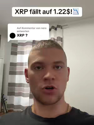 A man with a shaved head is speaking directly to the camera. Above him is a text overlay that reads "XRP fällt auf 1.22$!" Additionally, there is a comment bubble with the text " Auf Kommentar von nero antworten XRP ?". The background seems to be a simple room with a wall and a curtain.