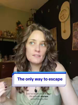 A woman with wavy brown hair is in a bedroom setting, looking slightly to the side as she speaks. She is wearing a green top and a pendant necklace. A text overlay, in a retro window style, reads 'The only way to escape'. Behind her is a wall with a gold clock and a dark background.