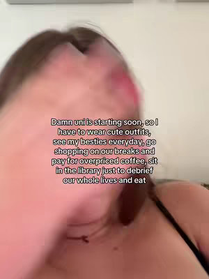 The image is a selfie of a person with blurred foreground elements. A text overlay outlines their college expectations.
